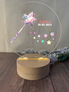 a personalized glass award with a star wand