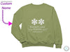 a green sweatshirt with a snowflake kisses for bailey on it