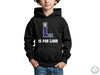 a young boy wearing a black hoodie with the letter l on it