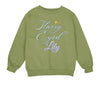 a green sweatshirt with a stary eyed lily on it